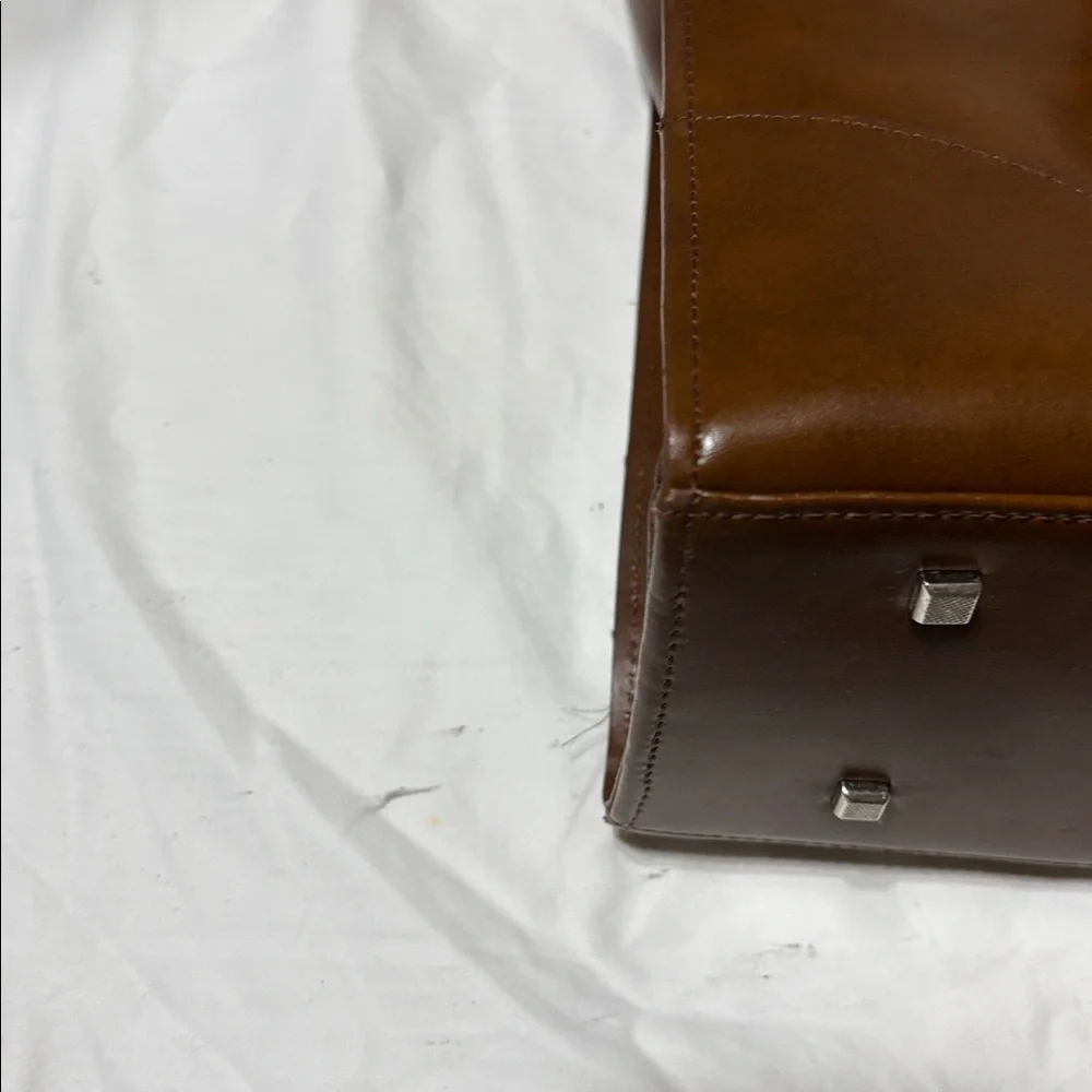 Franklin Covey leather bag with multiple compartments and padding. NWOT